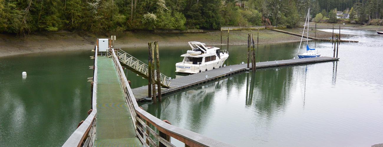 Dock with boat in lagoon