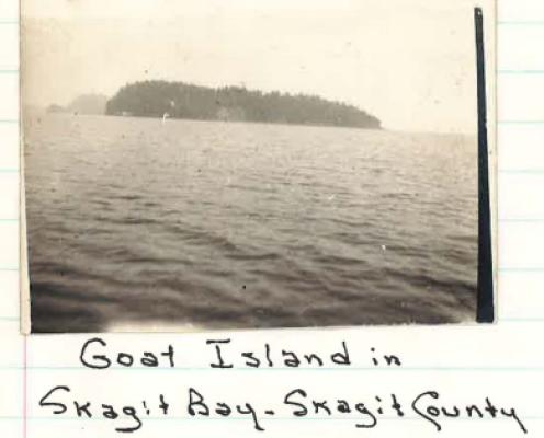 A historic sepia toned photo of an island with caption