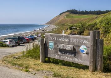 park entrance sign by beach