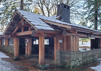 rustic building made of timber and stone