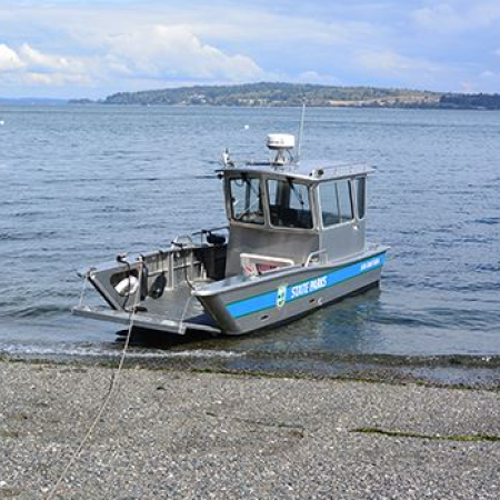 Clark Island Park Boat sitting in the water