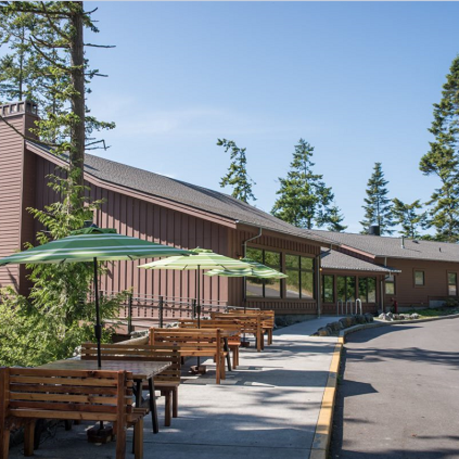 Cama Beach Cama Center Exterior with tables and umbrellas