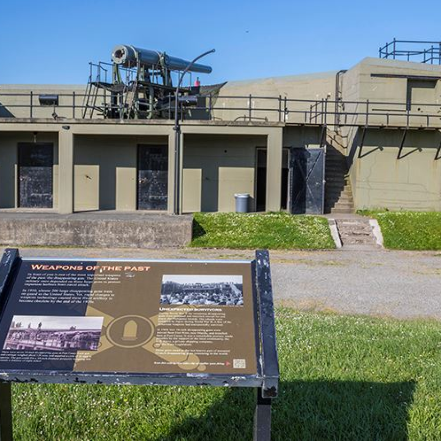 Old gun battery on a sunny blue sky day