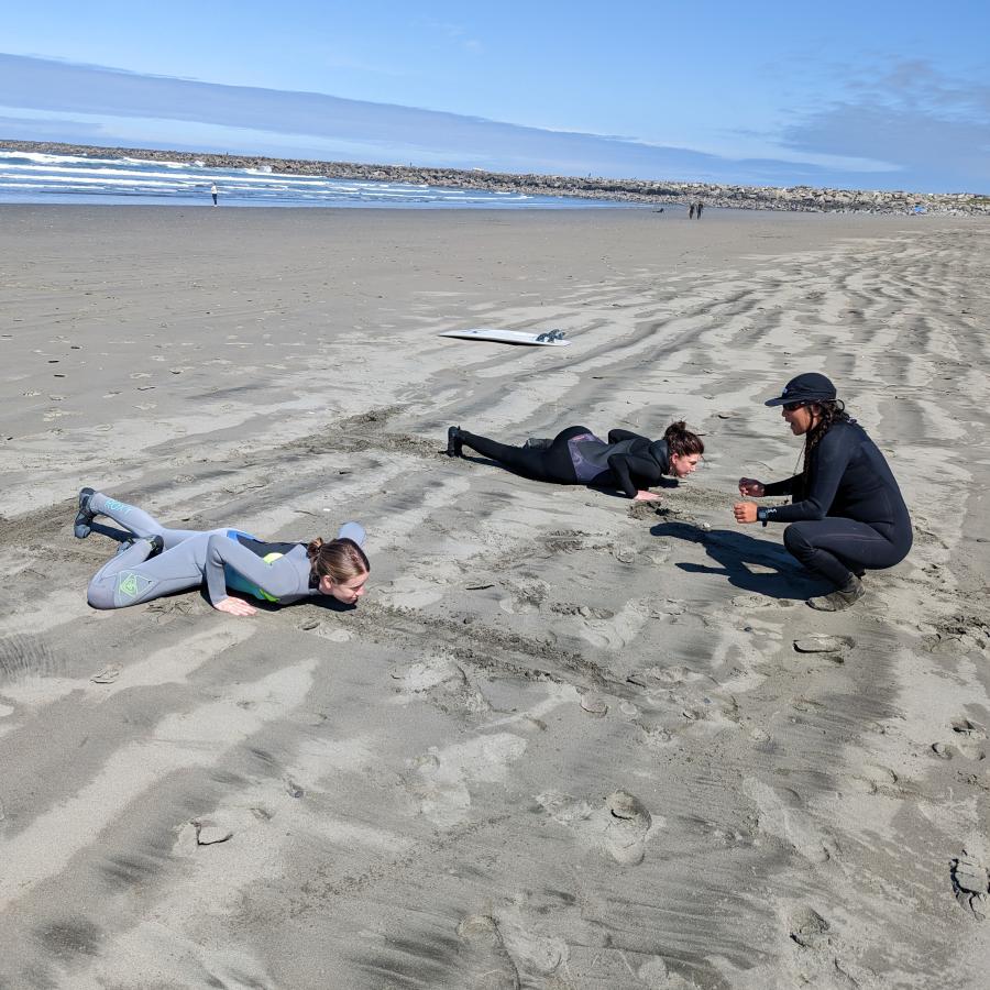 Kids learning surfing techniques